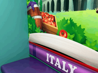 A vibrant pediatric exam room features a purple examination table. The wall displays a colorful mural with the Colosseum, a basket of grapes, and a crate of tomatoes. The word Italy is prominently displayed across the wall near the table.